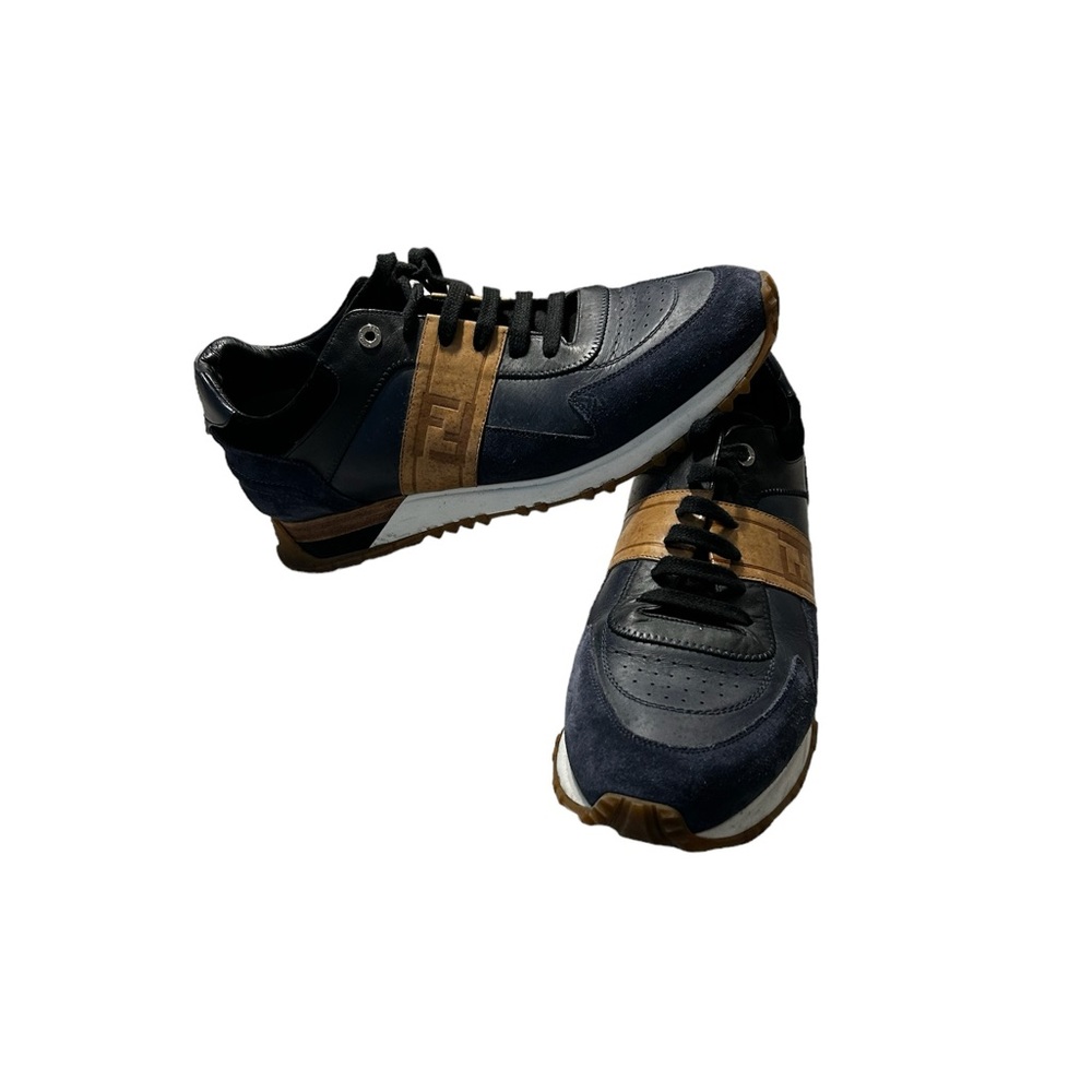 Men used Fendi Sneakers sz 10. Do not come with a box.